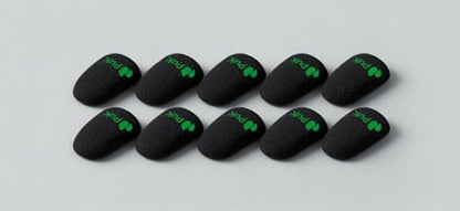 Ten PuK gaming thumb sleeves laid flat showing green PuK logo